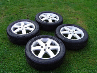 4X LETNÍ HLINÍKOVÁ KOLA SUZUKI SWIFT 185/60 R15