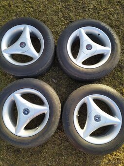 Třípaprsková alu kola Artec 7Jx15H2,rozteč 4x108