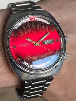Hodinky Orient vecny kalendar / cerveno-visnovy ciselnik