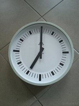 Nástěnné hodiny Pragotron PK 27 PS100