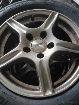 Kola ALU Ford Focus II / C-MAX 195/65R15 All Seasons