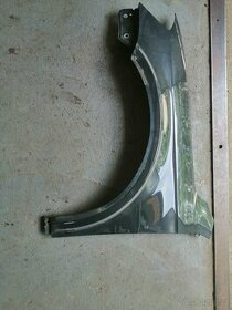 VW Passat B7, levý přední blatník