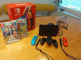 Nintendo Switch OLED v záruce + hry + účet