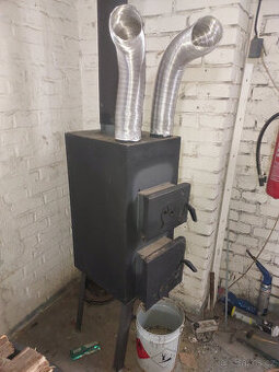 Kamna na dřevo do dilny garaze