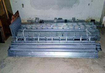 Rolovací ocelová vrata- mříže použitá funkční.