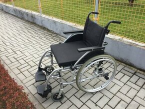 Invalidní vozík - ještě se zárukou