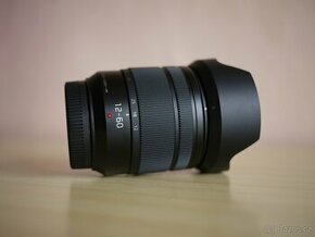 Objektiv Panasonic 12-60mm f 3,5-5,6+filtry UV a PL...