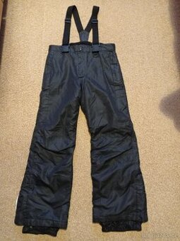 Šusťákové kalhoty Crivit vel. 134/140 černé barvy