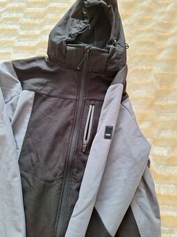 Pracovni softshellova bunda.