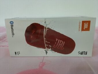 JBL Flip 6 Bluetooth box v červené barvě.