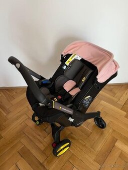 Autosedačka s integrovaným podvozkem DOONA plus