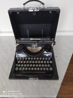 KUFŘÍKOVÝ PSACÍ STROJ