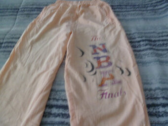 Dámské šusťákové kalhoty levně