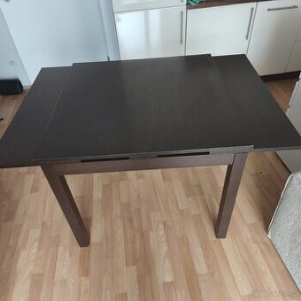 Rozkládací jídelní stůl tmavě hnědá IKEA bjursta