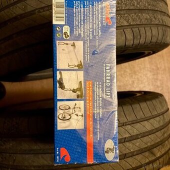 Drzak na kolo s kladkou