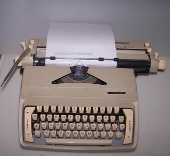 kufříkový psací stroj