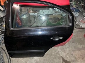 Dveře L. zadní Octavia 1 RS 9910 Černa met.