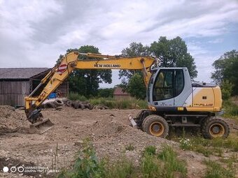 Bagr kolový new Holland mh city 18t