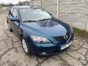 Mazda 3  1,6i 77kw