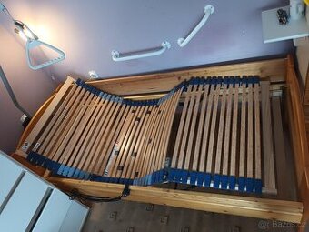 Postel, hrazda k lůžku