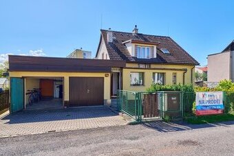 Prodej rodinného domu se 2 byty, dvougaráží a zahradou v Tru