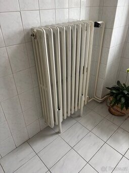 Prodám litinové radiátory.