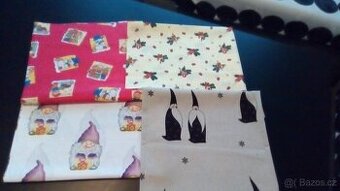 Zbytky látek vánoční,zimní motiv,cena celkem.