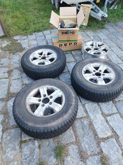 Sada alu disků off road + přední světlomety Sorento