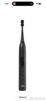 Sonický zubní kartáček