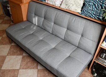 Rozkládací čalouněná pohovka