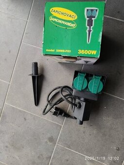 Stojan se zásuvkami - nepoužitý