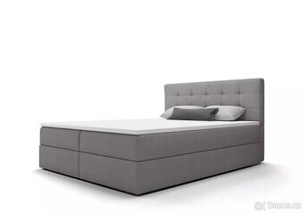 Úplně nová šedá postel 180 cm – zabalená