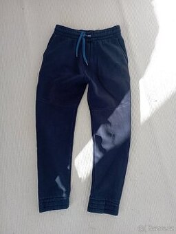 Teplé tmavě modré tepláky O´Neill vel.140-145cm