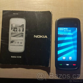 Nokia 5230 -červený kryt + sluchátka+ nabíječka