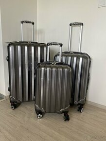 Nové perleťové šedé cestovní kufry - doporučuji - 1
