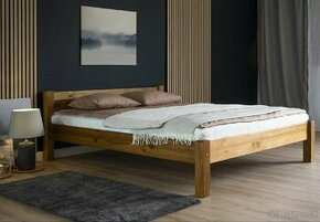 Manželská postel z masívu včetně roštu a matrace