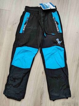 Zimní šusťákové kalhoty Sezon nové