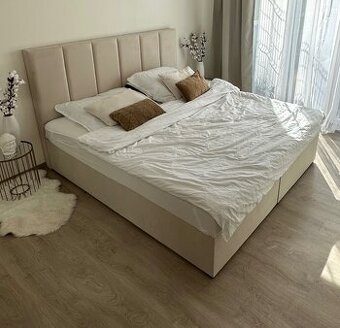 Čalouněná postel 180×200 s úložným prostorem a matracemi