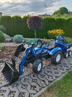 Šlapací traktor New Holland s nakladačem a rypadlem