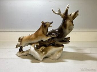 REZERVACE porcelánová soška DUX štvanice