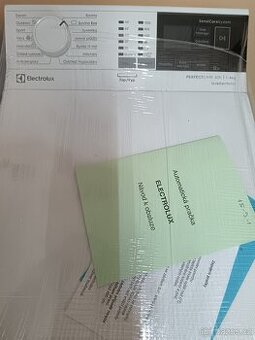 Vrchem plněná pračka Electrolux