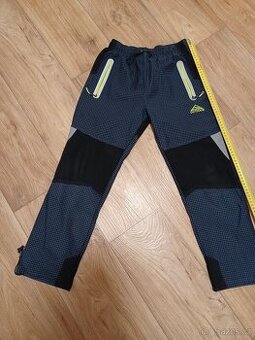 Kugo chlapecké kalhoty modré 146 reflexní kapsy