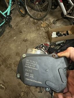 Škrtící klapka passat B7 06F133062Q