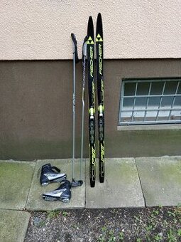 set na běžky Fischer , 140cm a hůlky 125cm