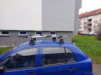 Střešní nosič + držáky kol