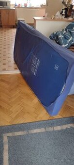 Polohovací postel