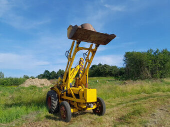Traktor bagr / nakladač Ford