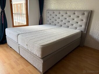 Čalouněná kontinentální postel s úložným prostorem