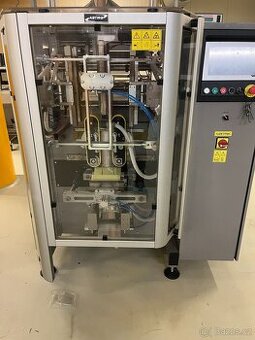 vertikální plnicí/uzavírací stroj