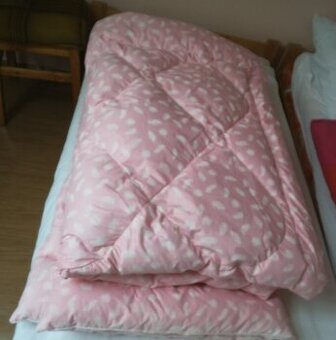 Prošívané péřové pokrývky